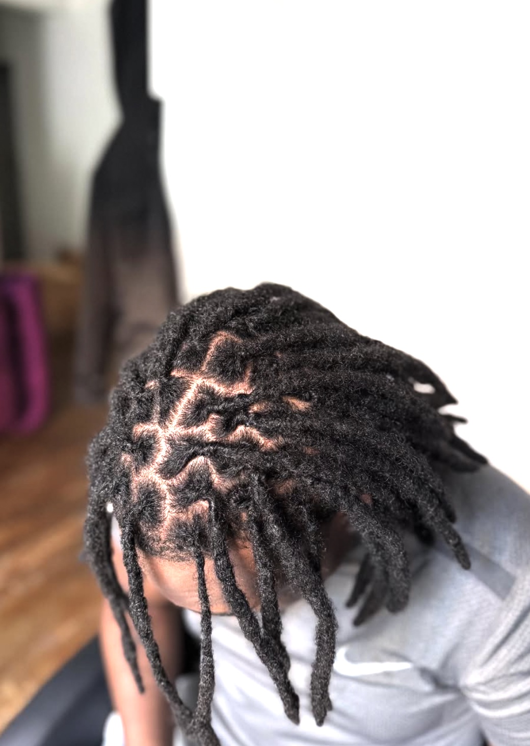 Coiffure locks entretenue par Dona Locs